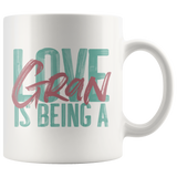 Love is being a Gran 11 oz White Coffee Mug