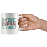 Love is being a Gran 11 oz White Coffee Mug