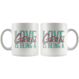 Love is being a Gran 11 oz White Coffee Mug