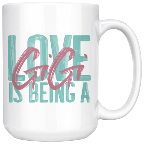 Love is being a Gigi 15 oz White Coffee Mug